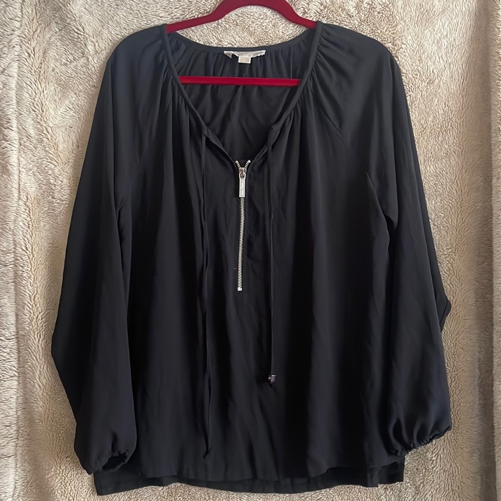 Black Michael Kors top.